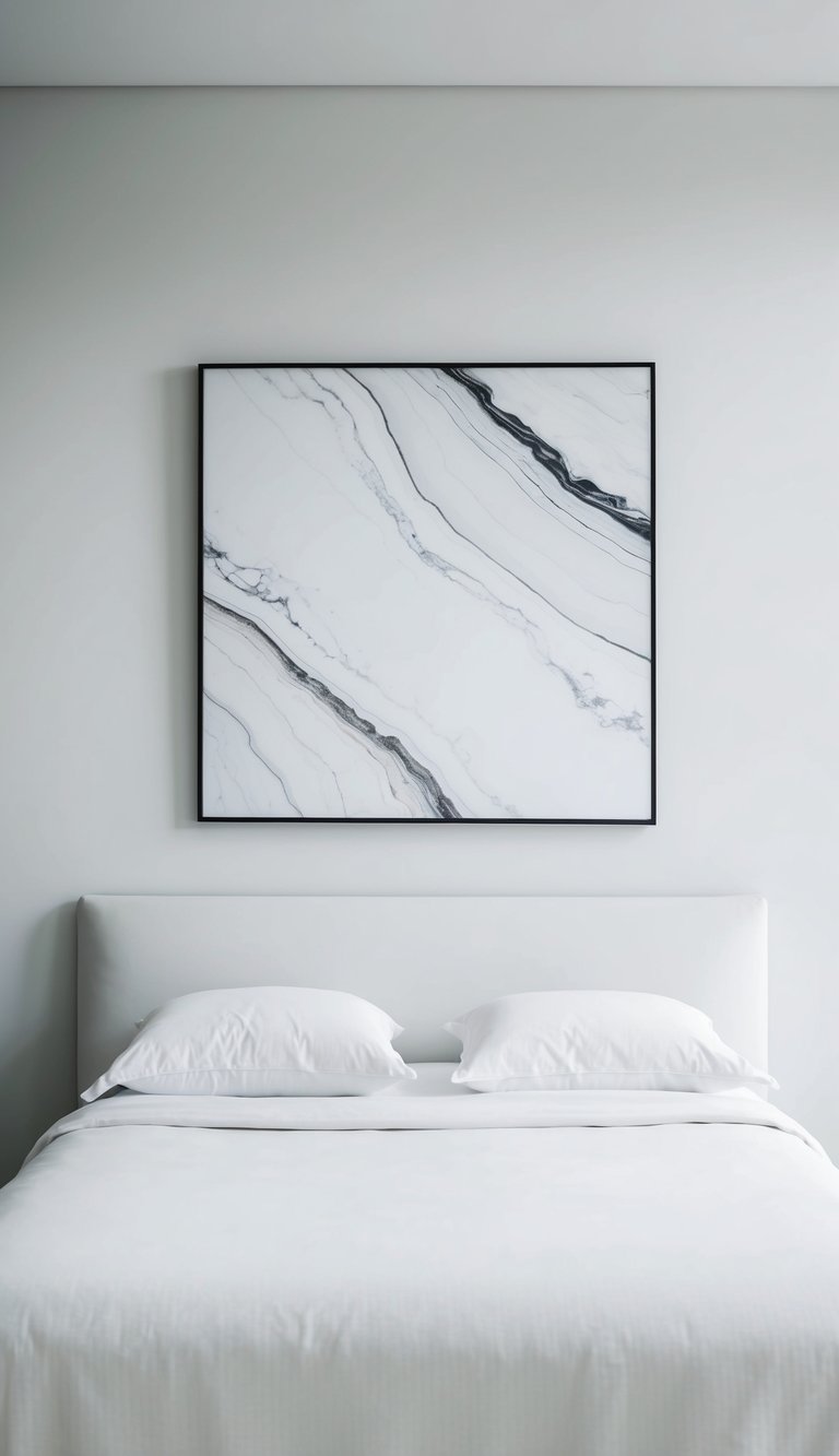 A white marbled wall art piece hangs above a modern bed in a minimalist white bedroom