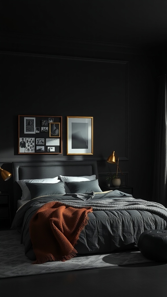 A dark moody bedroom featuring a black headboard, grey bedding, an orange throw blanket, and metallic accents.